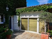 Pose d’une baie vitrée triple vitrage avec volet roulant à Dardilly dans l’Ouest Lyonnais